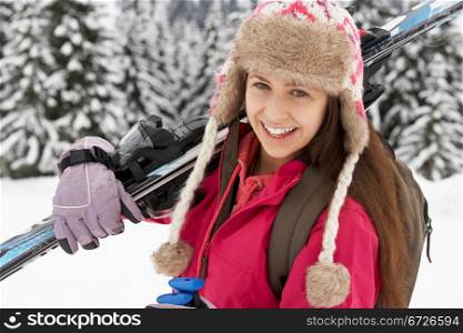 Teenage Girl On Ski Holiday In Mountains