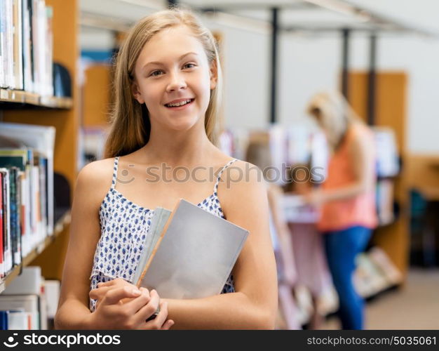 Teenage girl picking a book in public library. That is a difficult choice