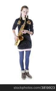 teenage girl plays saxophone against white background in studio