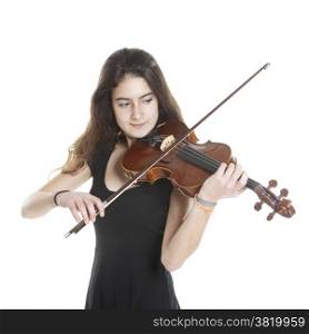 teenage girl plays violin in studio with white background