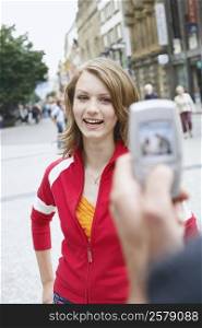 Teenage girl posing for a photograph