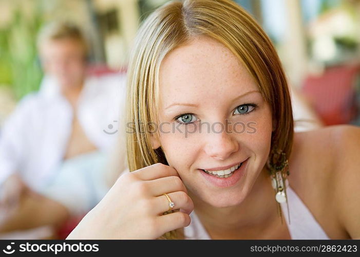 Teenage Girl Relaxing Poolside