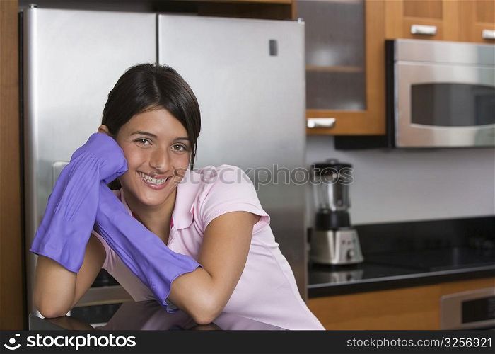 Teenage girl smiling in the kitchen