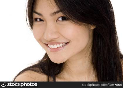 Teenage girl standing and smiling