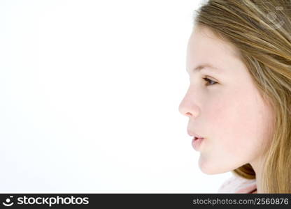 Teenage girl standing with mouth open