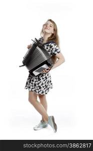 teenage girl stands in studio with accordion against white background