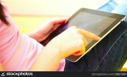 Teenage Girl Using Digital Tablet close up