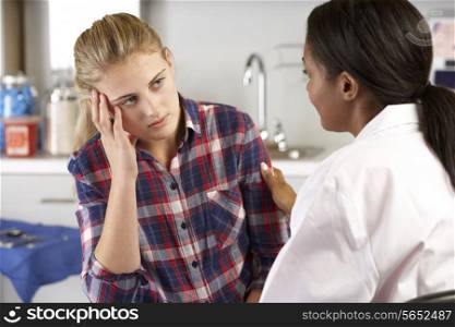 Teenage Girl Visits Doctor&#39;s Office Suffering With Depression