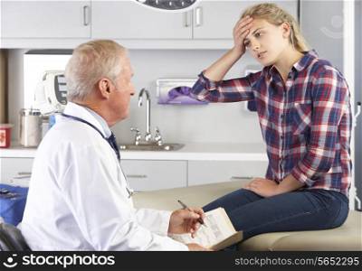 Teenage Girl Visits Doctor&#39;s Office With Headaches
