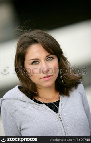 Teenage girl wearing hooded sweater