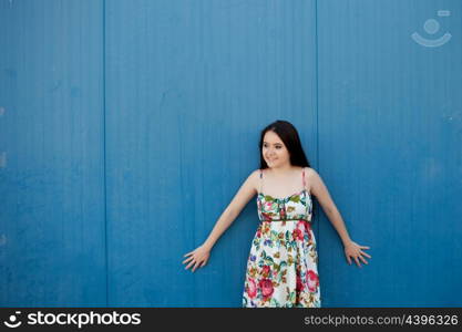 Teenage girl with a blue background on the outside