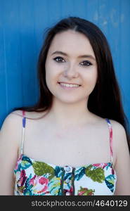 Teenage girl with a blue background on the outside