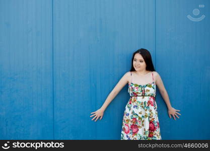 Teenage girl with a blue background on the outside