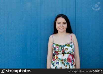 Teenage girl with a blue background on the outside