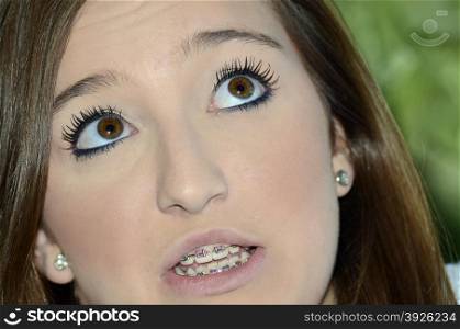 Teenage Girl with Braces Looking Up