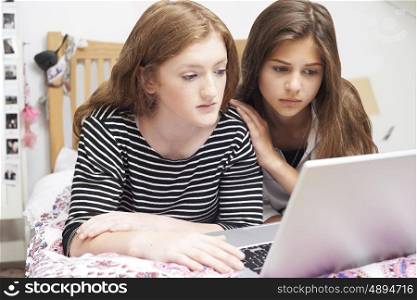 Teenage Girl With Friend Being Bullied On Line
