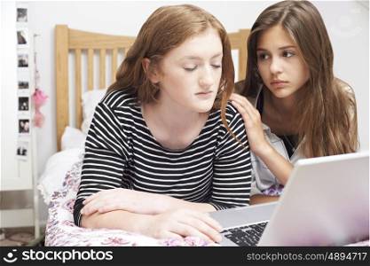 Teenage Girl With Friend Being Bullied On Line