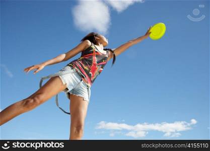 Teenage girl with frisbee