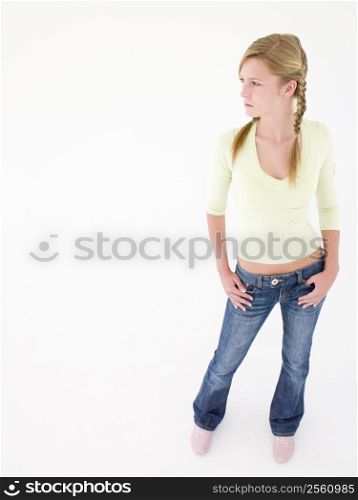 Teenage girl with hands on hips