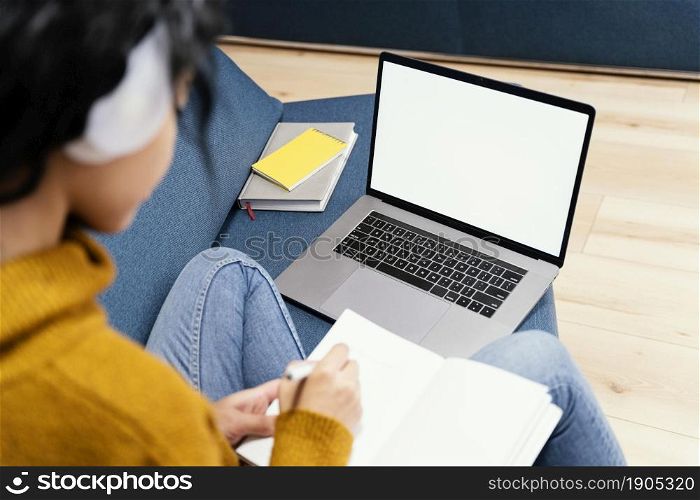 teenage girl with headphones laptop during online school. Beautiful photo. teenage girl with headphones laptop during online school