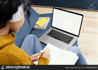 teenage girl with headphones laptop during online school. Beautiful photo. teenage girl with headphones laptop during online school