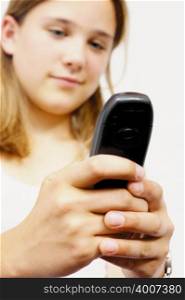 Teenage girl with mobile telephone