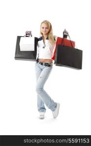 teenage girl with shopping bags over white