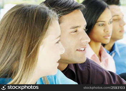 Teenage girl with two young men and a young woman