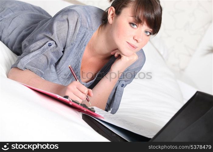 Teenage girl working on an assignment