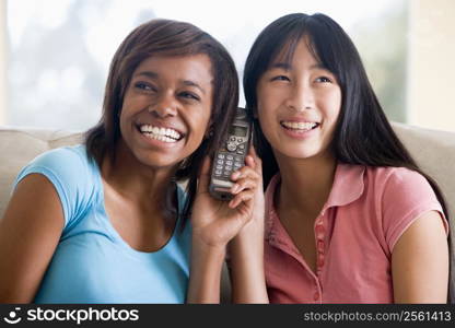 Teenage Girls Talking On Telephone