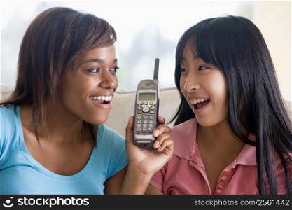 Teenage Girls Talking On Telephone