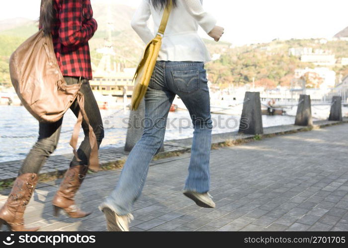 Teenage girls walking away