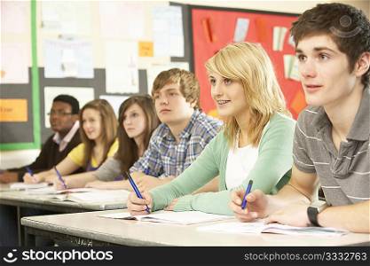 Teenage Students Studying In Classroom