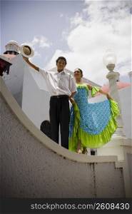 Teenaged children wearing Plena traditional attire