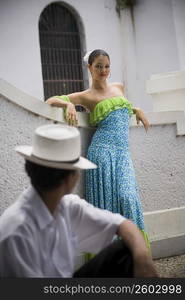 Teenaged children wearing Plena traditional attire, outdoors