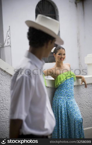 Teenaged children wearing Plena traditional attire, outdoors