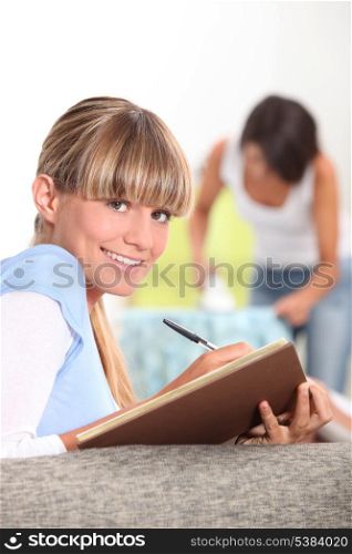Teenager at home doing homework