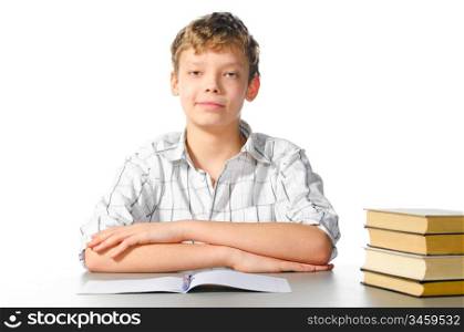 teenager boy is sitting at table on white background