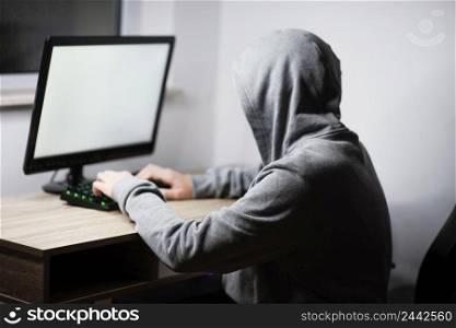 teenager boy playing computer 2