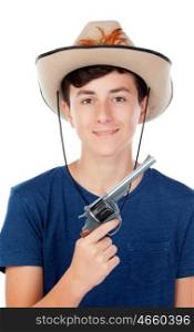 Teenager boy with a cowboy hat and a gun isolated on white background