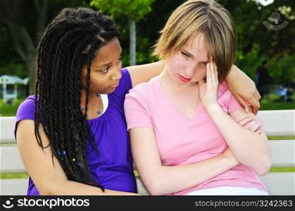 Teenager consoling her friend