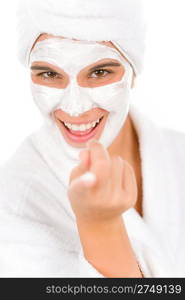 Teenager facial mask - happy woman on white background