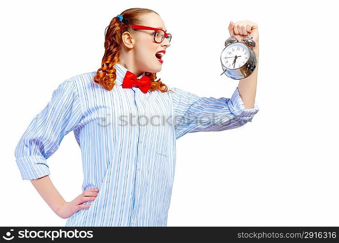 Teenager girl holding alarm clock
