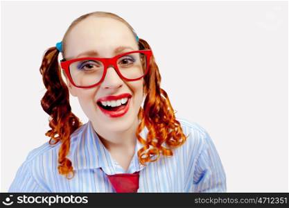 Teenager girl in red glasses. Teenager girl with pigtails in red glasses