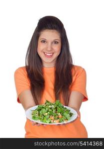 Teenager girl with a plate of vegetables isolated on white background