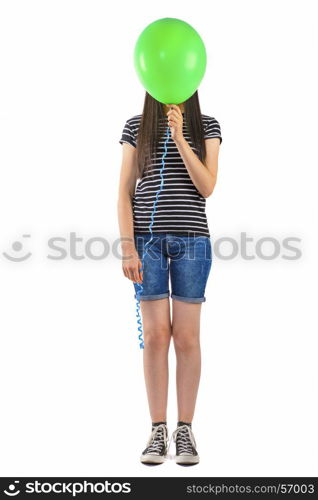 Teenager girl with balloon cover her face on white background.