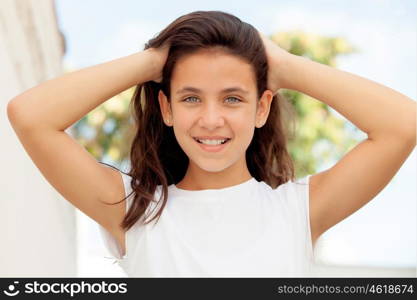 Teenager girl with blue eyes smiling outdoor