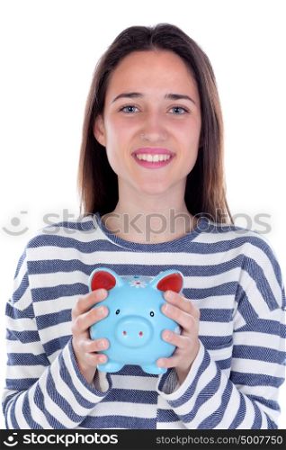 Teenager girl with blue piggy bank isolated on a white background