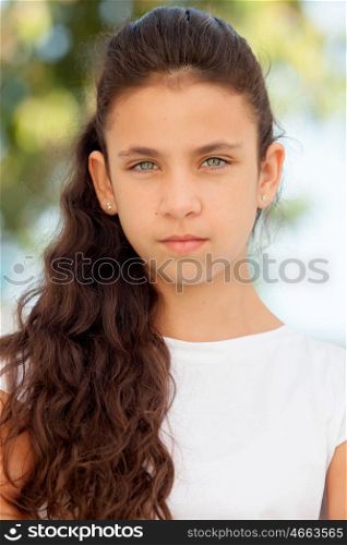 Teenager girl with looking at camera outdoor