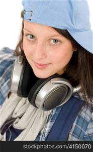 Teenager happy girl enjoy music with headphones and baseball cap